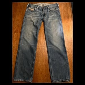 Diesel Jeans low waist straight cut. Embroiled back zipper pockets.